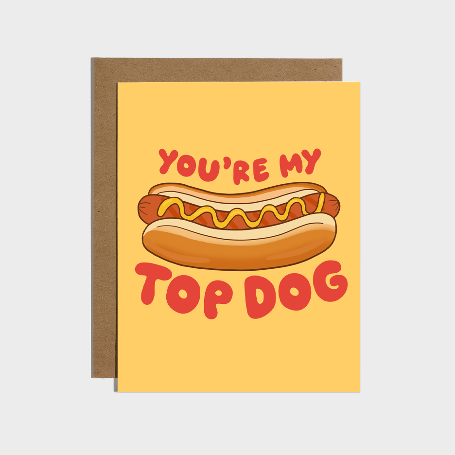 Greeting card with a hot dog illustration and text 'You're my top dog' on a yellow background.
