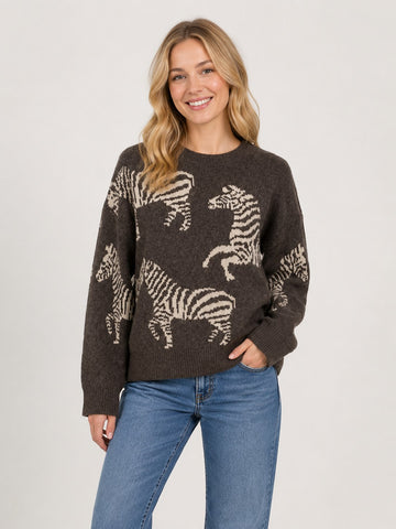 Adorable sweater with zebras.
