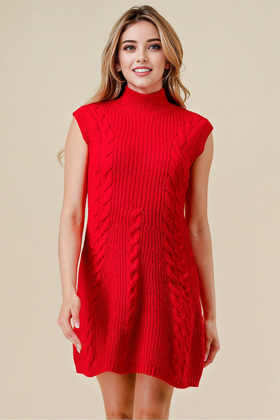 Woman wearing a red knitted dress against a beige background