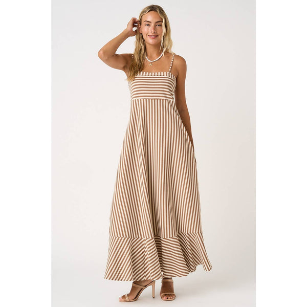 Woman wearing a striped dress on a white background