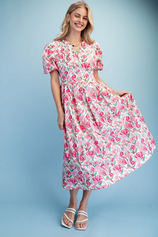 Woman wearing a floral dress on a light blue background