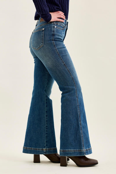 Judy Blue women's petite high-waisted flare jeans in a medium blue wash featuring a double-button tummy control waistband and 30-inch inseam.