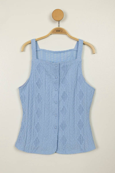 Light blue sleeveless top on a wooden hanger against a beige background