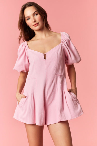 Women's washed denim bubble sleeve romper with tuck pleat details, 100% cotton, perfect for summer boutique style.
