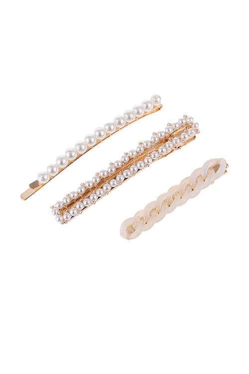three pearl hair clips